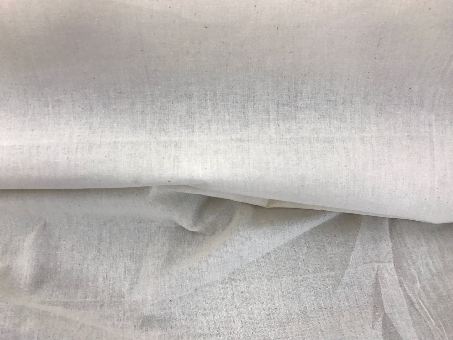 Ivory Muslin natural 100% cotton medium quality unbleached fabric - 45 - 48" wide - pattern maker fabric - sold by the yard. - New Creations Fabric & Foam Inc