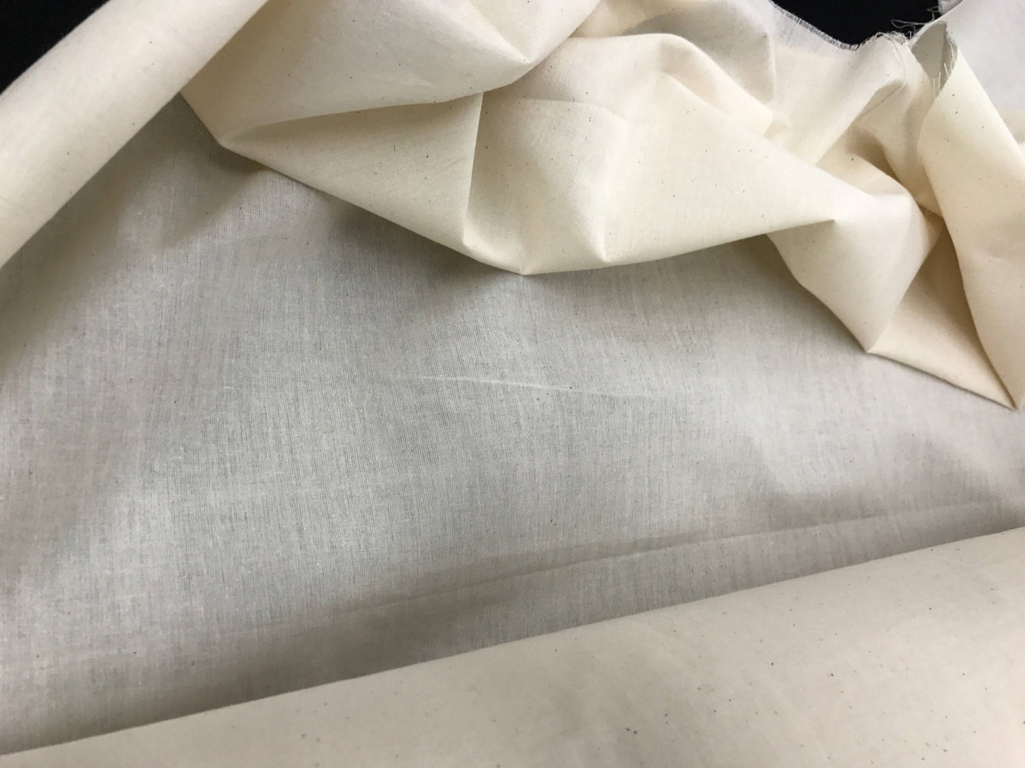Ivory Muslin natural 100% cotton medium quality unbleached fabric - 45 - 48" wide - pattern maker fabric - sold by the yard. - New Creations Fabric & Foam Inc